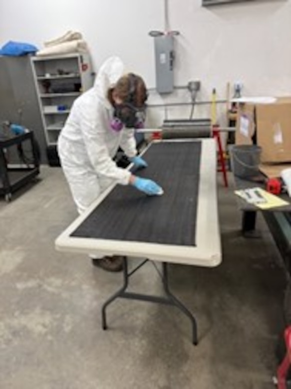 A U.S. Army Corps of Engineers employee prepares FRP material in accordance with approved installation procedures, during the Fiber Reinforced Polymer (FRP) Installation Certification course, April 8-10, 2025, at Albeni Falls Dam, Oldtown, Idaho.
