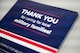 A TRICARE pamphlet sits on a table. The text reads: "Thank you for caring for local military families!"