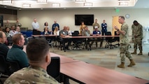 91st Missile Wing Commander Col. Jimmy Schlabach speaks to a group of civilian medical providers.