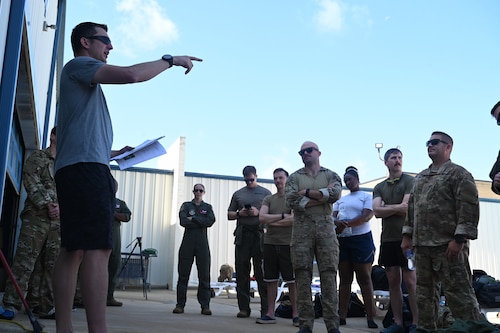 a person instructs a class
