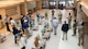 Airmen guide a tour of civilian medical providers inside Minot Air Force Base's hospital.