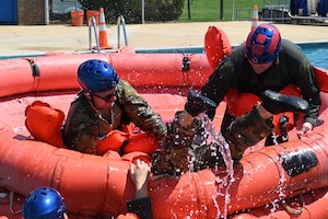 people help someone onto a life raft