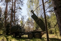 A U.S. Army M142 High Mobility Artillery Rocket System assigned to Able Battery, 3rd Battalion, 321st Field Artillery Regiment supporting Task Force Voit, engages in a fire mission during Exercise Hedgehog near Võru, Estonia, May 13, 2025. Exercise Hedgehog, Estonia's largest military exercise, includes over 16,000 Estonian and allied troops training to plan and execute operations that enhance interoperability and readiness across NATO. Long-range artillery, armored tanks, and aircraft are V-Corps’ cornerstone warfighting capabilities that enable the Corps to remain lethal and agile along NATO’s Eastern Flank. (U.S. Army photo by Spc. Rachel Hall)
