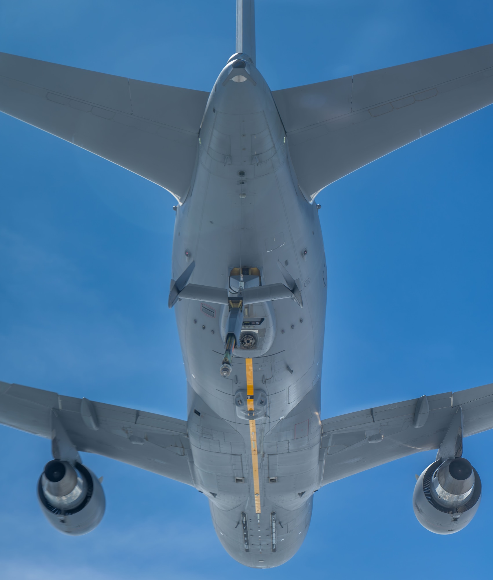 A KC-46A Pegasus assigned to McConnell Air Force Base prepares to refuel a KC-46 over the U.S., June 13, 2025. The KC-46’s refueling boom can refuel most fixed-wing, receiver-capable aircraft. (U.S. Air Force photo by Airman 1st Class Paula Arce)