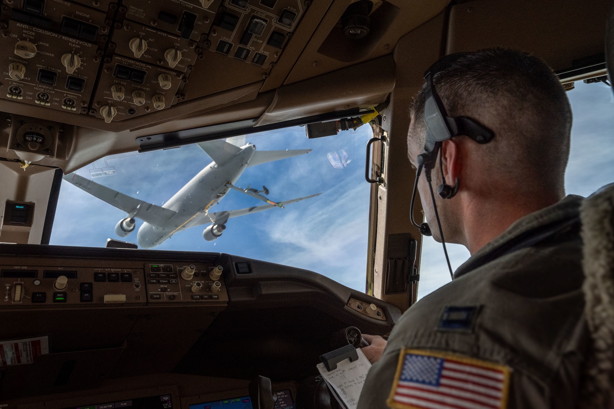 A KC-46A Pegasus assigned to McConnell Air Force Base prepares to refuel a KC-46 over the U.S., June 13, 2025. The KC-46’s refueling boom can refuel most fixed-wing, receiver-capable aircraft. (U.S. Air Force photo by Airman 1st Class Paula Arce)