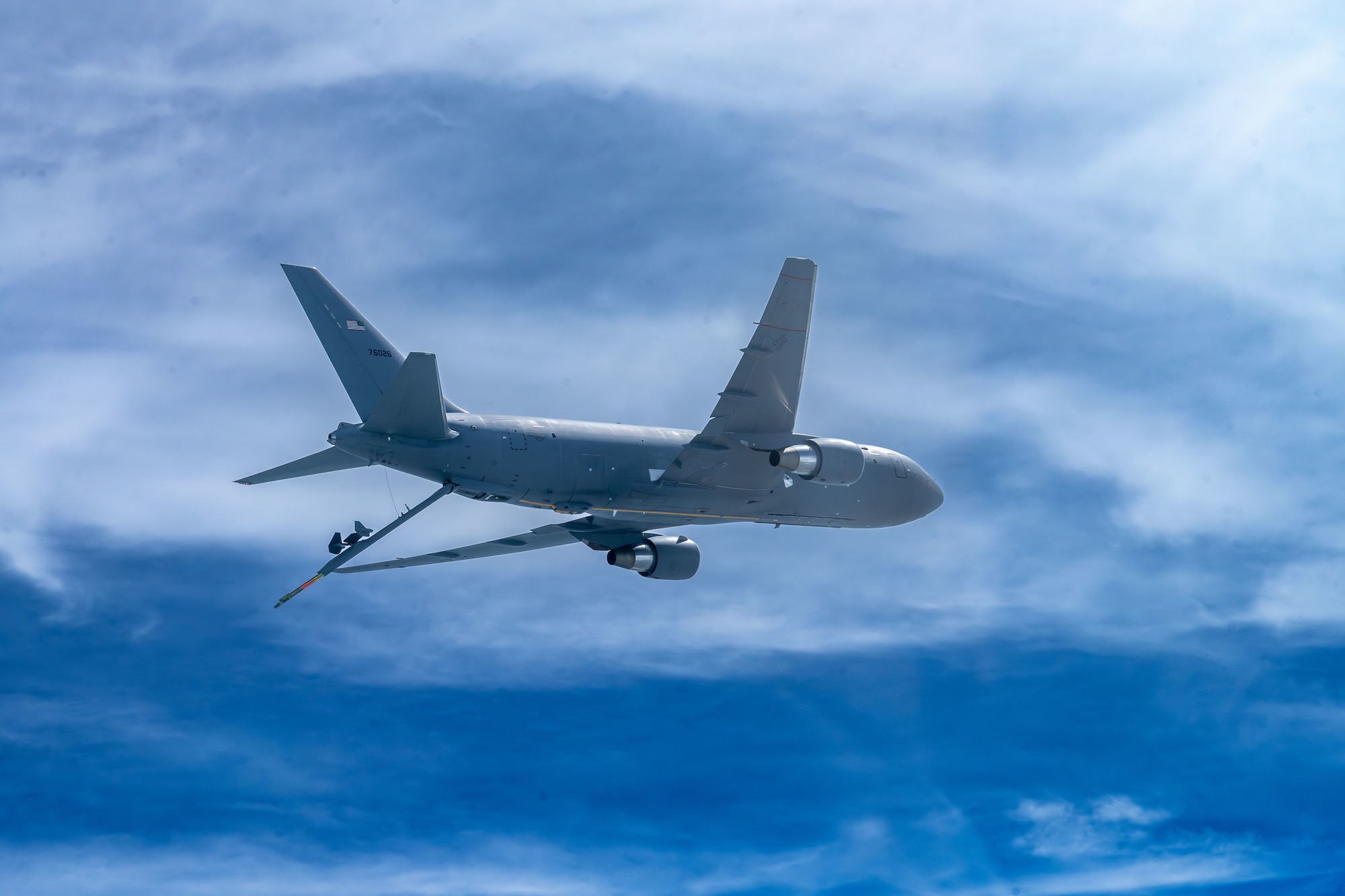 A KC-46A Pegasus assigned to McConnell Air Force Base prepares to refuel a KC-46 over the U.S., June 13, 2025. The KC-46’s refueling boom can refuel most fixed-wing, receiver-capable aircraft. (U.S. Air Force photo by Airman 1st Class Paula Arce)