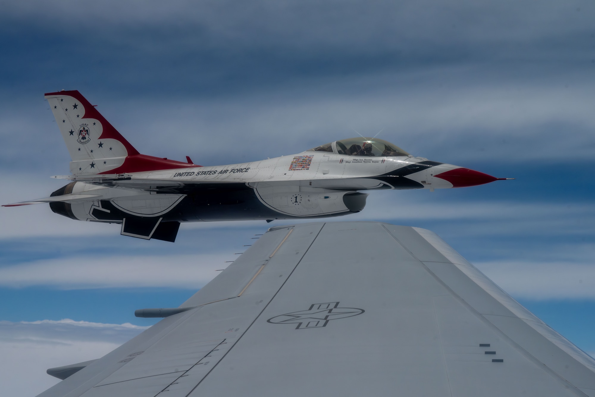 A U.S. Air Force Air Demonstration Squadron "Thunderbirds" waits to be refueled by a KC-46A Pegasus assigned to McConnell Air Force Base, Kansas, over the U.S., June 13, 2025. The KC-46 crew offloaded approximately 75,000 pounds of fuel to the Thunderbirds. (U.S. Air Force photo by Airman 1st Class Paula Arce)