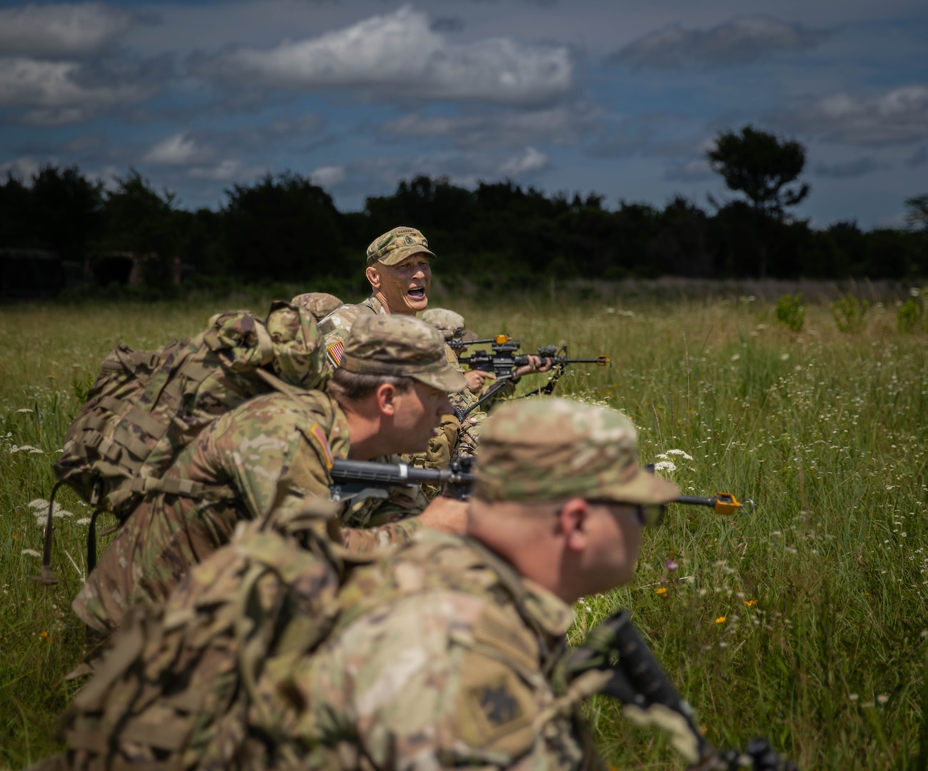 1st Sgt. Jaime Jimenez, assigned to the Army National Guard Warrior Training Battalion, models a tactical drill to students conducting the Light Leaders Course on June 8, 2025 at Camp Gruber Training Center, Oklahoma. Light Leaders Course is an intensive, leadership development program designed to sharpen small unit tactics and develop agile, adaptable and deployment-ready combat leaders. (Oklahoma National Guard photo by Spc. Cambrie Cannon)