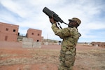 U.S. Army Staff Sgt. Chadley Simms, infantryman, 1st Battalion-157th Infantry (Mountain), Colorado Army National Guard uses handheld counter-unmanned aerial system equipment to neutralize a simulated drone threat during a drone warfare familiarization course at a Fort Carson, Colorado, training range, April 15, 2025. The course, led by the Drone Warfare Cell, part of the Multi-Domain Special Operations Cell at 5th Battalion, 19th Special Forces Group (Airborne), COARNG, paired traditional guard members with special forces to build interoperability and strengthen joint UAS threat response capabilities. (U.S Air National Guard photo by Senior Airman Melissa Escobar-Pereira)