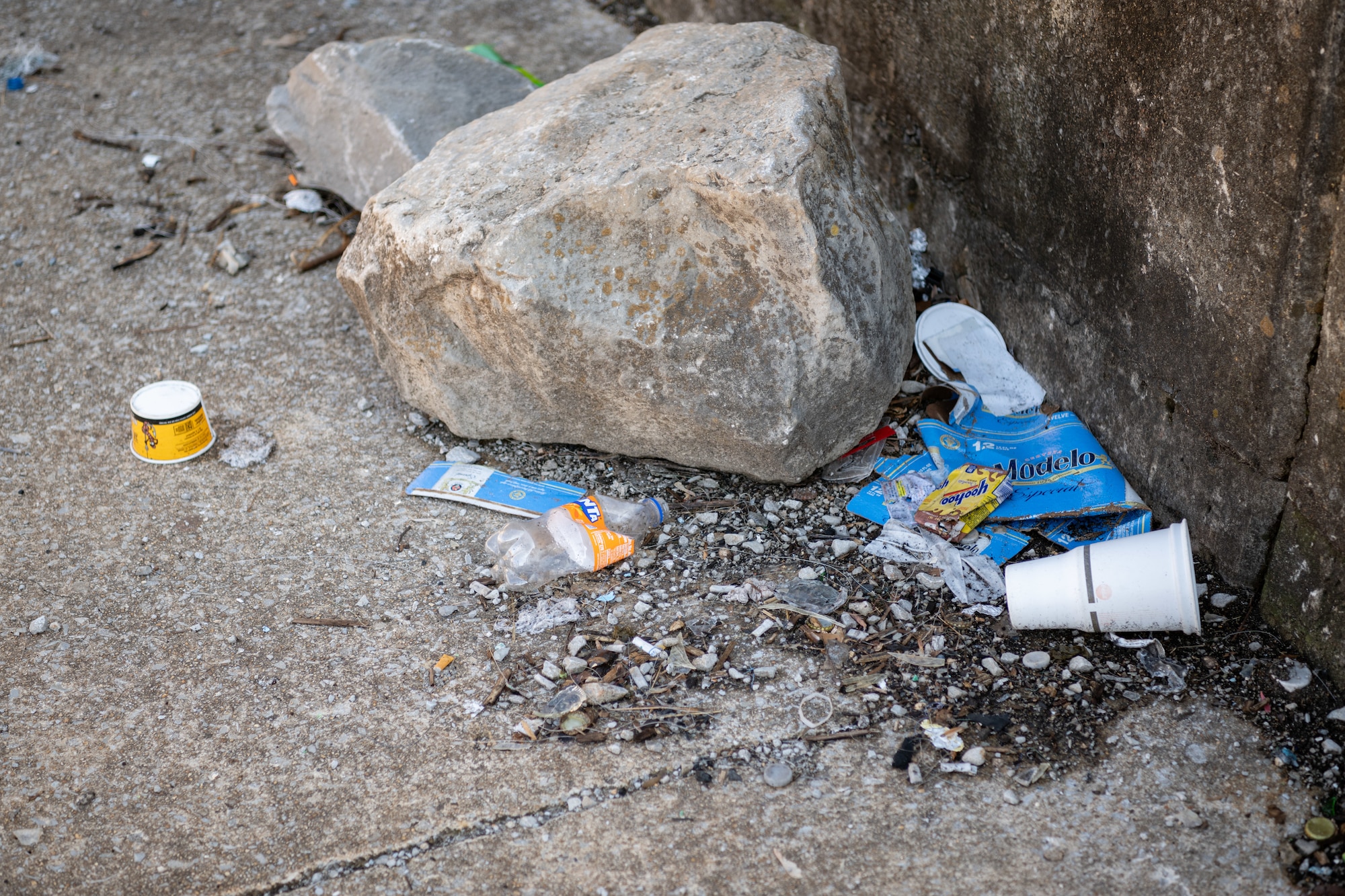 Trash is found scattered along a training wall of the Elk River Dam on Arnold Air Force Base, Tenn., January 28, 2025. Work is set to soon begin to prevent public access to the dam structure through the installation of security fencing around the downstream training walls. The effort is to ensure property security and safety in the area. The river will still be accessible to recreationalists for fishing and other activities. (U.S. Air Force photo by Keith Thornburgh)