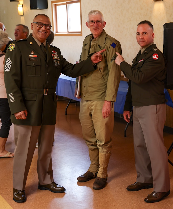 Image of the 84th Training Command's command team, posing with 88th Readiness Division Historian.