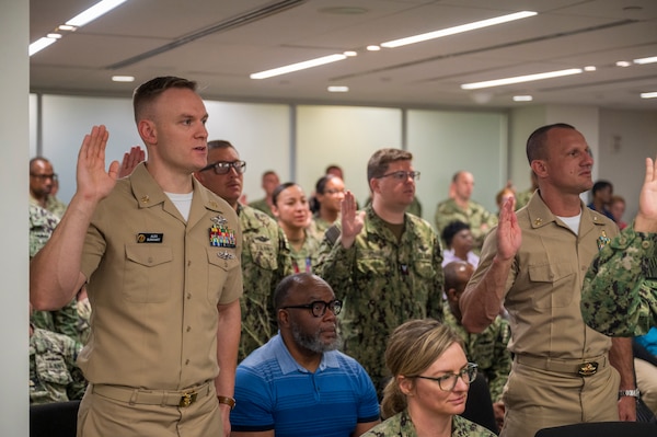 250617-N-IX644-1053 (June 17, 2025) FALLS CHURCH, Va. Past and present Hospital Corpsmen recite the Hospital Corpsman’s Pledge during a celebration for the 127th birthday of the Navy Medicine Hospital Corps at the Defense Health Headquarters, June 17. The Navy Hospital Corps is comprised of more than 26,000 active duty and reserve Hospital Corpsmen that are practicing or training in 40 technical specialties. Hospital Corpsmen are enlisted medical sailors who serve on the frontlines with our operators - whether embedded in Marine units, serving at MTFs, or aboard submarines and surface ships as Independent Duty Corpsmen. (U.S. Navy photo by Mass Communication Specialist 2nd Class Sasha Ambrose)