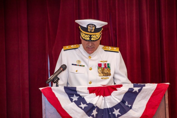 250617-N-KC192-1115 PORTSMOUTH, Va. (June 17, 2025) Rear Adm. Kevin Brown, former commander, Naval Medical Forces Atlantic (NMFL), reads his transfer orders during a change of command ceremony held on board Hampton Roads - Portsmouth Annex, June 17, 2025. During the ceremony, Brown was relieved by Rear Adm. Robert Hawkins, who will take over as commander, Naval Medical Forces Atlantic and director of Defense Health Network - Atlantic. (U.S. Navy photo by Mass Communication Specialist 2nd Class Levi Decker)