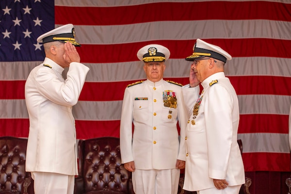 250617-N-KC192-1124 PORTSMOUTH, Va. (June 17, 2025)  Rear Adm. Kevin Brown, the former commander, Naval Medical Forces Atlantic (NMFL), salutes Rear Adm. Robert Hawkins, commander, NMFL, during a change of command ceremony held on board Hampton Roads - Portsmouth Annex, June 17, 2025. Hawkins will also serve as the director of Defense Health Network - Atlantic.  (U.S. Navy photo by Mass Communication Specialist 2nd Class Levi Decker)