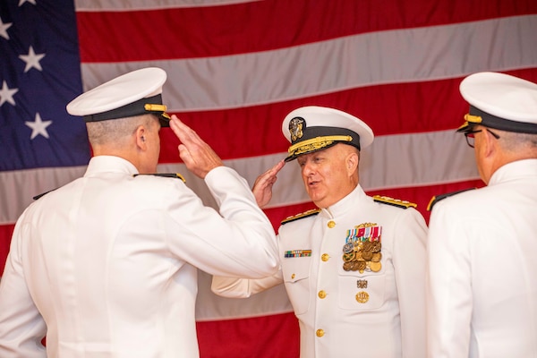 250617-N-KC192-1126 PORTSMOUTH, Va. (June 17, 2025) Rear Adm. Kevin Brown, the former commander, Naval Medical Forces Atlantic (NMFL), salutes Rear Adm.Darin K. Via, Navy Surgeon General, as he is relieved by Rear Adm. Robert Hawkins, commander, NMFL, during a change of command ceremony held on board Hampton Roads - Portsmouth Annex, June 17, 2025. (U.S. Navy photo by Mass Communication Specialist 2nd Class Levi Decker)
