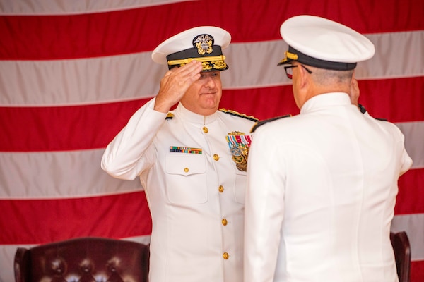 250617-N-KC192-1129 PORTSMOUTH, Va. (June 17, 2025) Rear Adm.Darin K. Via, Navy Surgeon General, salutes Rear Adm. Robert Hawkins, commander, Naval Medical Forces Atlantic (NMFL), as he assumes command during a change of command ceremony held on board Hampton Roads - Portsmouth Annex, June 17, 2025. During the ceremony, Hawkins relieved Rear Adm. Kevin Brown who served as commander, Naval Medical Forces Atlantic and director of Defense Health Network - Atlantic since June 2024. (U.S. Navy photo by Mass Communication Specialist 2nd Class Levi Decker)