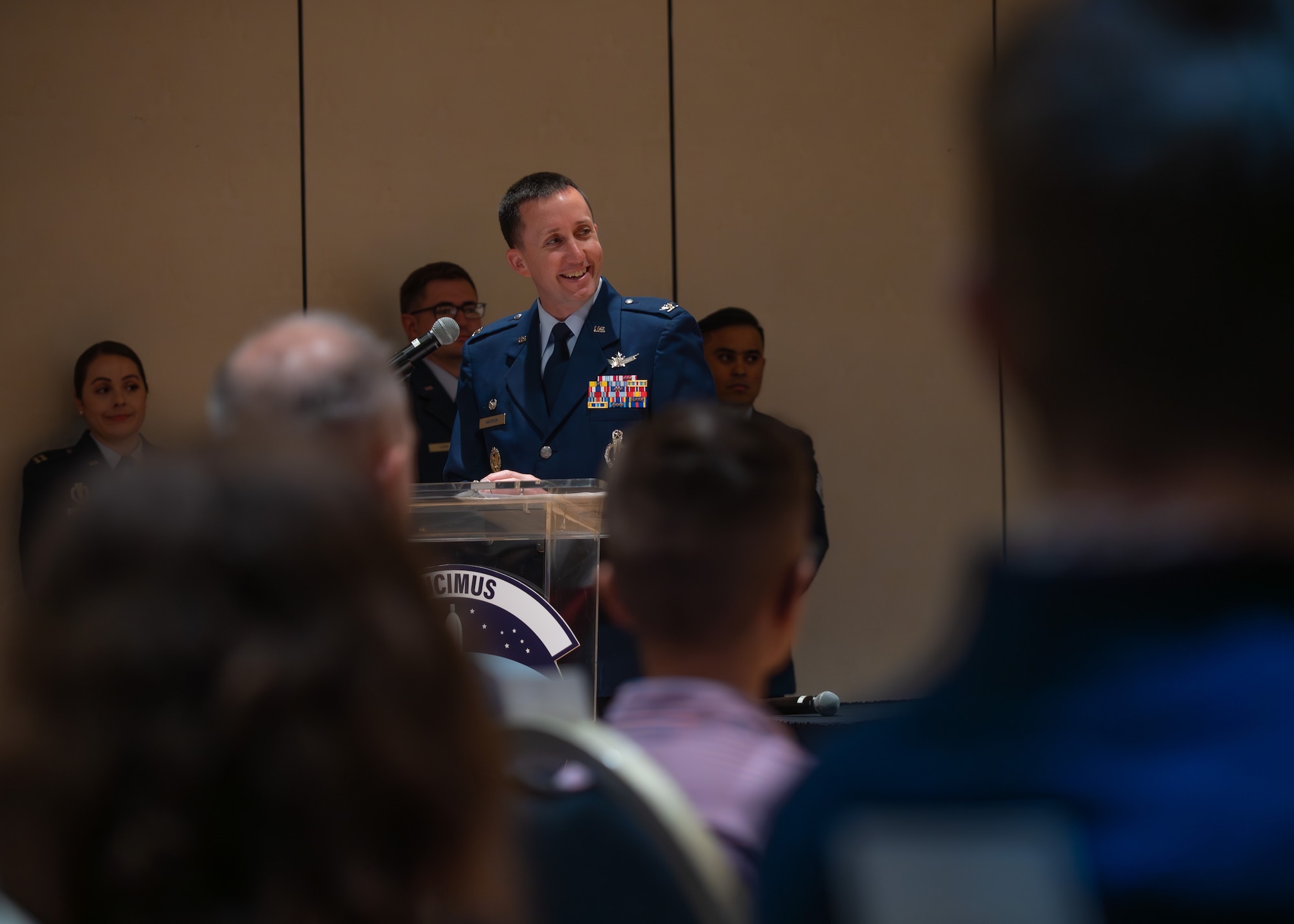 U.S. Air Force Col. Dustin Harmon, 377th Test and Evaluation Group commander, speaks to attendees of the 576th Flight Test Squadron change of command ceremony at Vandenberg Space Force Base, Calif., June 17, 2025. Harmon presided over the ceremony, where U.S. Air Force Lt. Col. Anthony Santino relinquished command to Lt. Col. Karrie Wray.