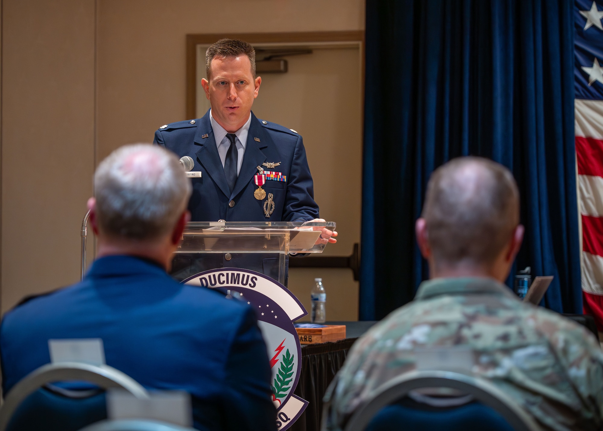 U.S. Air Force Lt. Col. Anthony Santino, outgoing 576th Flight Test Squadron commander, speaks to attendees of the 576 FLTS change of command ceremony at Vandenberg Space Force Base, Calif., June 17, 2025. Santino relinquished command of the 576 FLTS to Lt. Col. Karrie Wray.