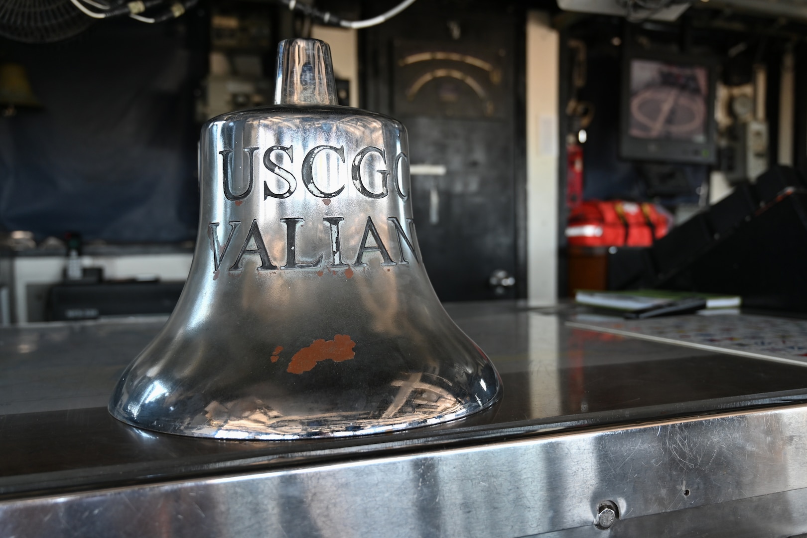 Coast Guard Cutter Valiant's (WMEC 621) bell is temporarily seen in the bridge for ship tours while the cutter is moored to the pier at Naval Station Mayport in Jacksonville, Florida, June 17, 2024. The cutter was honored after more than 57 years of service during a heritage recognition ceremony held in front of Coast Guard and cutter leadership, the assembled crew and former crew members, family and friends. (U.S. Coast Guard photo by Petty Officer 2nd Class Brandon Hillard)