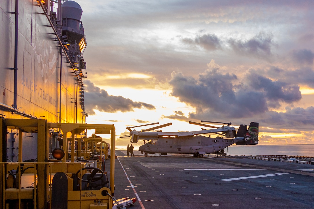 A U.S. Marine Corps MV-22B Osprey aircraft assigned to Marine Medium Tilt Rotor Squadron 265 (Rein.), 31st Marine Expeditionary Unit, staged on the flight deck for fast-rope training aboard the amphibious assault ship USS America (LHA 6), in the Bismarck Sea, June 6, 2025. Marines participated in fast-rope training to enhance air-to-ground insertion capabilities for future operations. The 31st MEU is operating aboard ships of the USS America Amphibious Ready Group in the 7th Fleet area of operations, the U.S. Navy’s largest forward-deployed numbered fleet, and routinely interacts and operates with allies and partners in preserving a free and open Indo-Pacific region. (U.S. Marine Corps photo by Lance Cpl. Victor Gurrola)