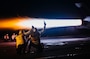 Sailors signal for an F/A-18F to launch off the flight deck of Nimitz-class aircraft carrier USS George Washington (CVN 73) while underway in the Philippine Sea, June 16, 2025.