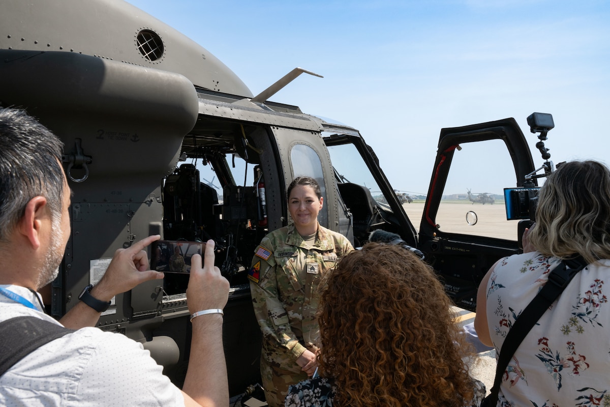 Sgt. Victoria Robinson answers questions during a media engagement.