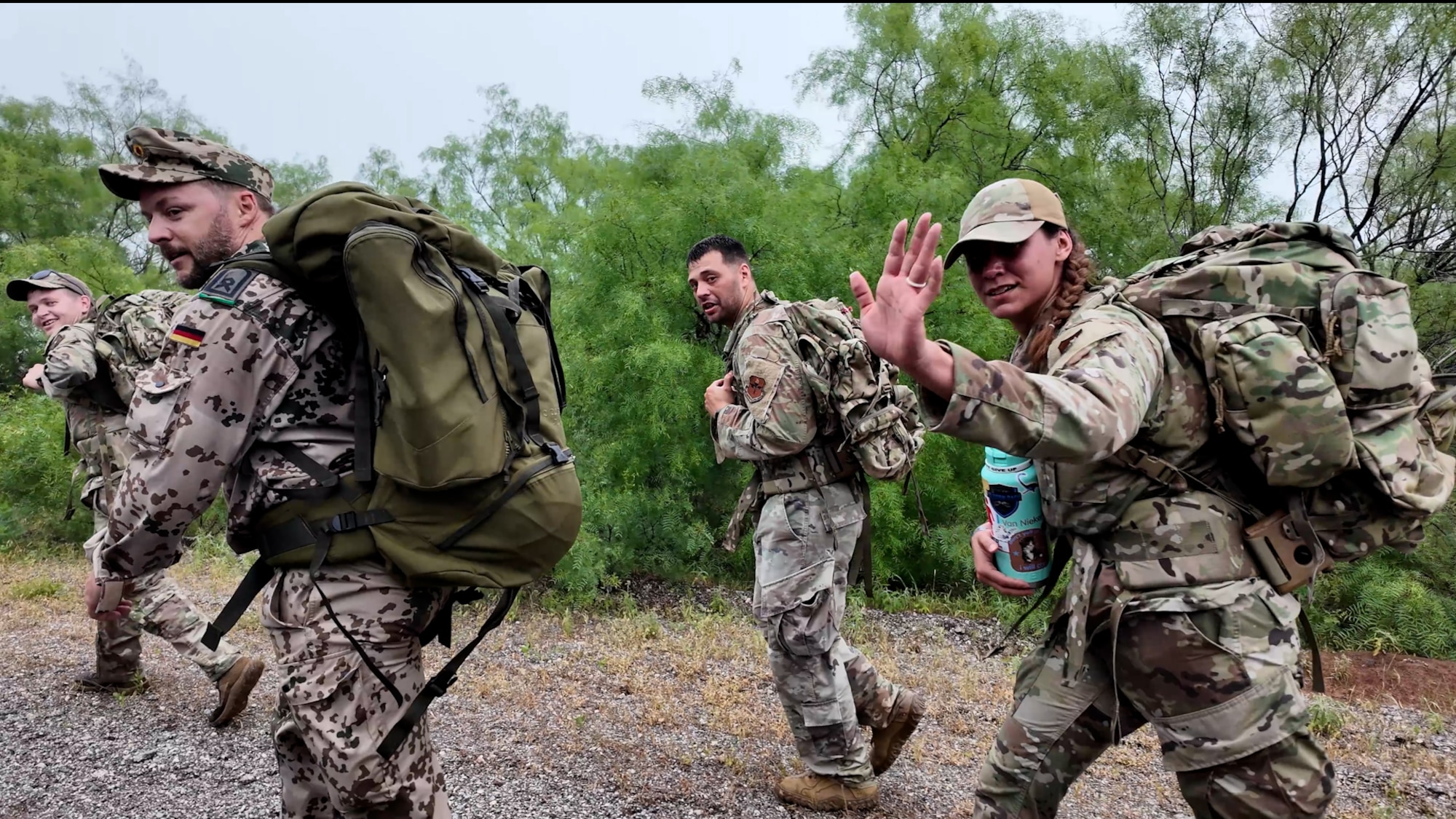 U.S and German servicemembers participate in a 12 kilometer ruck as part of earning the German Armed Forces Proficiency Badge.