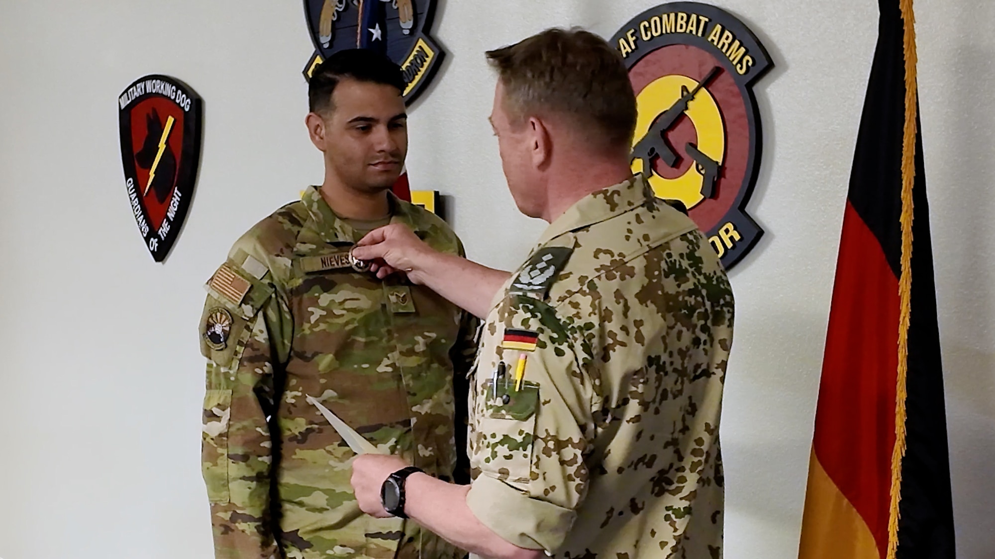 Col Georg Wolters pins participants with the GAF Proficiency badge