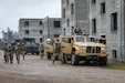U.S. Army soldiers assigned to Charlie Company, 1st Battalion, 64th Armored Regiment, 1st Armored Brigade Combat Team, 3rd Infantry Division, supporting Task Force Iron, joined multinational soldiers from Poland, Lithuania, Romania, and Czechia for Exercise Brave Boar in Bemowo Piskie Training Area, Poland, May 17, 2025. During the exercise, U.S. soldiers conducted joint training with NATO multinational partners in a simulated urban environment. Task Force Iron's mission is to engage in multinational training and exercises across the continent to increase lethality, while strengthening partnerships with NATO allies and regional security partners. The task force provides combat-credible forces to V Corps, America’s only forward-deployed corps in Europe. (U.S. Army photo by Sgt. Trevor Wilson)