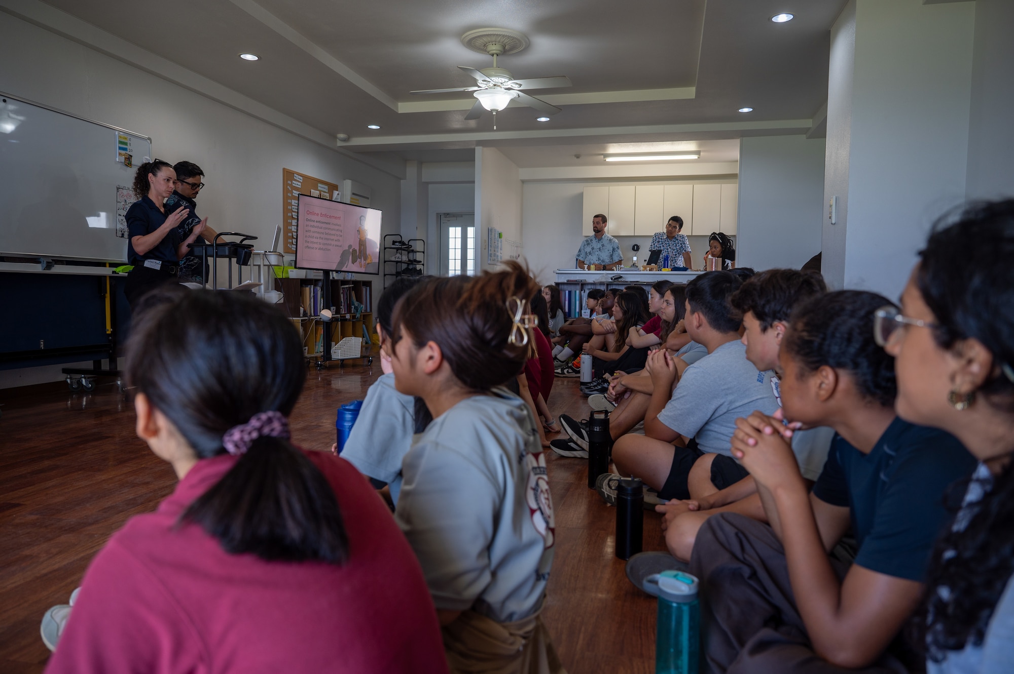 Students listen to lecture.