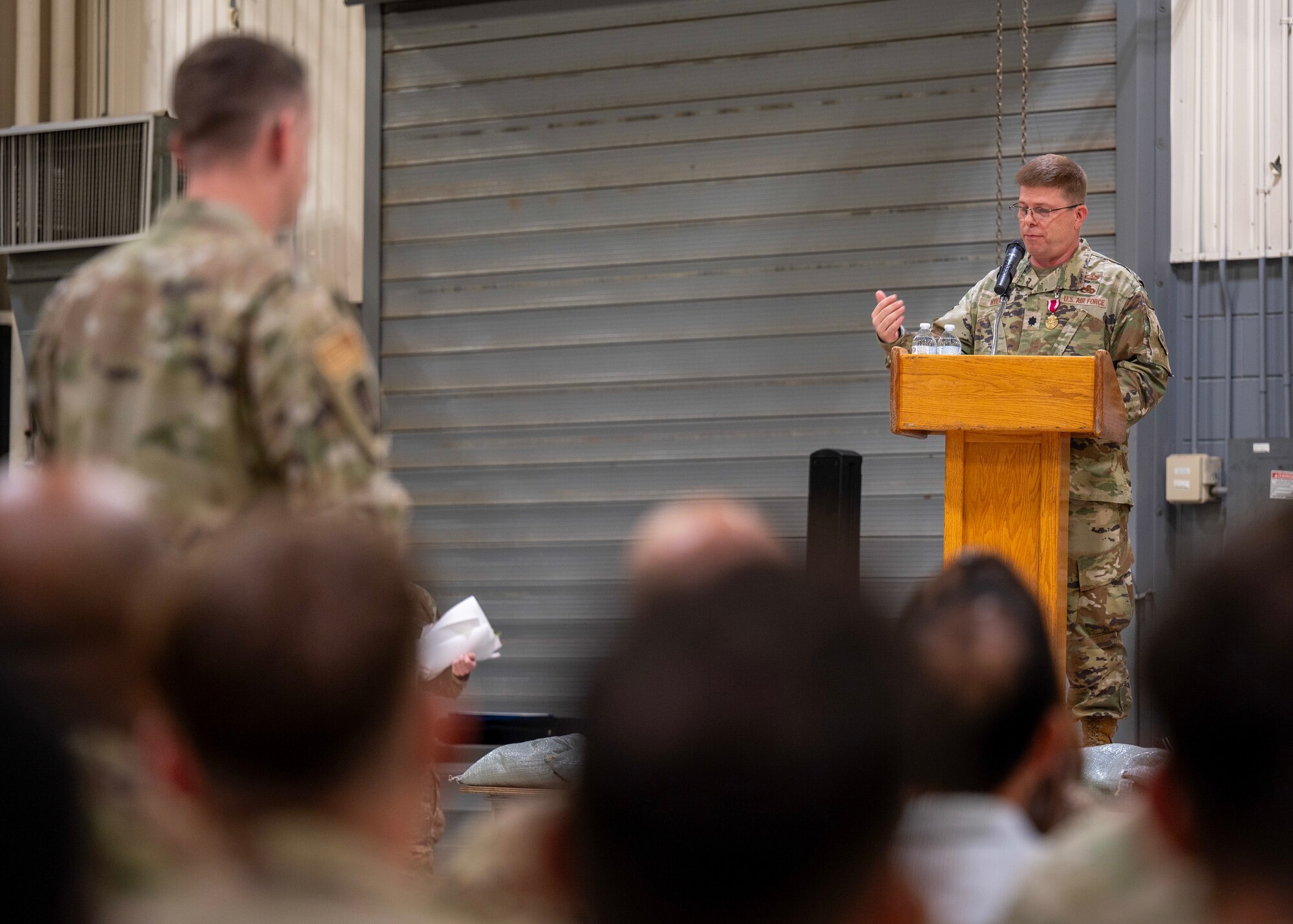 U.S. Air Force Lt. Col. Brian Myers, outgoing 51st Munitions Squadron commander, delivers farewell remarks during a Change of Command ceremony at Osan Air Base, Republic of Korea, June 17, 2025. The 51st MUNS builds, maintains and delivers lethal armament and munitions in support of contingency and deliberate operations. (U.S. Air Force photo by Staff Sgt. Sarah Williams)