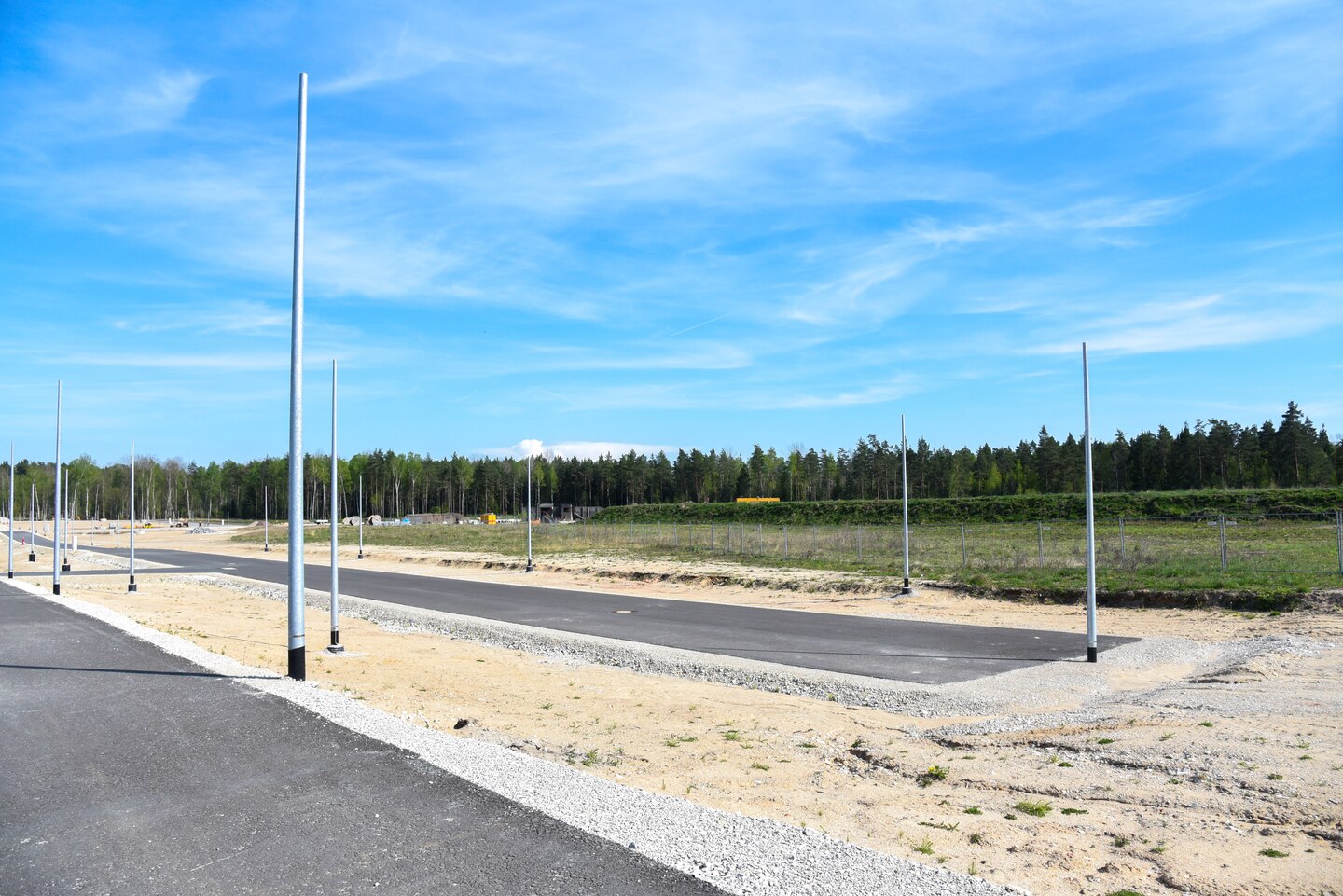area of flat ground with power poles
