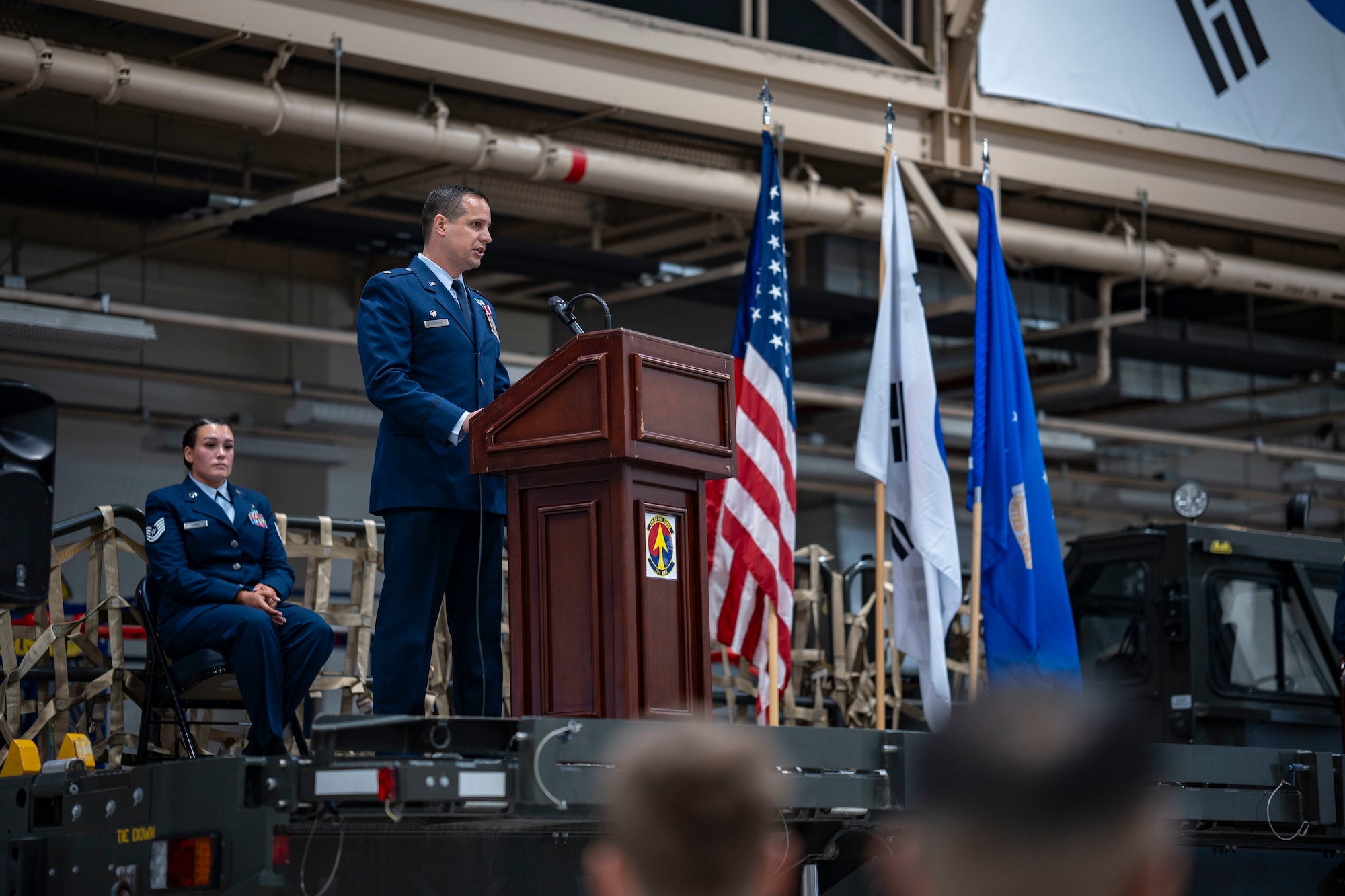 U.S. Air Force Lt. Col. Lucas Berreckman, outgoing 731st Air Mobility Squadron commander, delivers farewell remarks during a Change of Command ceremony at Osan Air Base, Republic of Korea, June 18, 2025.