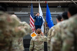 U.S. Air Force Lt. Col. Diana Halferty, incoming 731st Air Mobility Squadron commander, renders her first salute during a Change of Command ceremony at Osan Air Base, Republic of Korea, June 18, 2025.