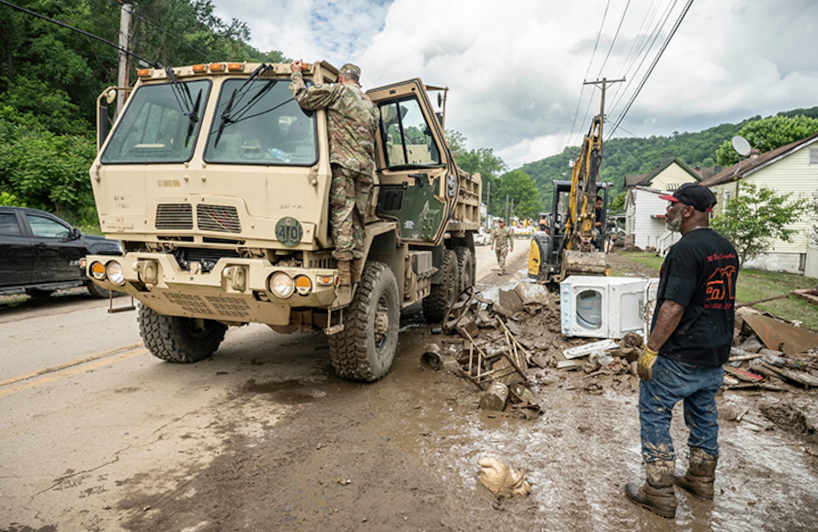 West Virginia National Guard Adjutant General Maj. Gen. Jim Seward visits with Guard members activated on flood response duty in Ohio County, West Virginia, on June 17, 2025.