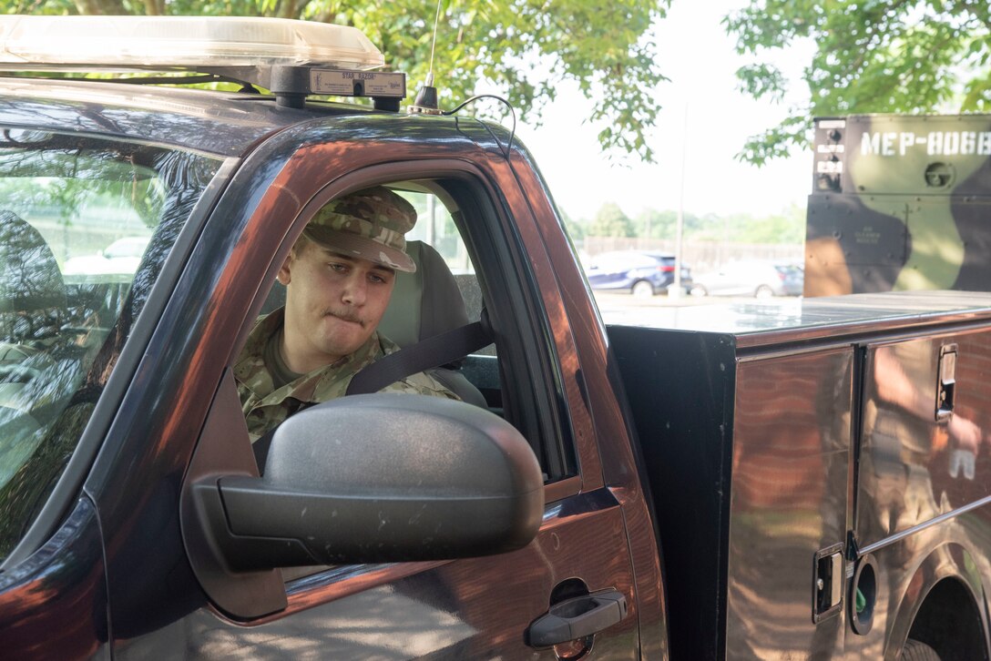 U.S. Air Force Airman 1st Class Nathanael J. Sweeney, 316th Civil Engineer Squadron electrical power production shop, positions a mobile generator outside the Tactical Fitness Center at Joint Base Andrews, Md., June 11, 2025. Members of the 316th CES helped transform both fitness centers and the Community Commons into living quarters for about 250 U.S. Army Soldiers who arrived at Andrews to participate in the Army’s 250th Birthday Festival and Parade in Washington, D.C.