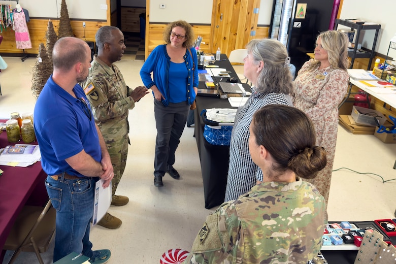U.S. Army Corps of Engineers, Louisville District Program Manager Jacob Sinkhorn speaks with residents and vendors with the Main Street Marketplace during a flood risk management study, May 13, 2025 in Beattyville, Kentucky. During the study, Sinkhorn reunited with his fifth-grade teacher, Kitty Dougoud.