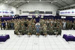 U.S. and Malaysian Armed Forces service members pose for a group photo during the Bersama Warrior 25 opening ceremony at the Joint Warfighting Center, Kuantan, Malaysia, June 17, 2025. Bersama Warrior is an annual, bilateral joint exercise sponsored by U.S. Indo-Pacific Command and hosted by the Malaysian Armed Forces.