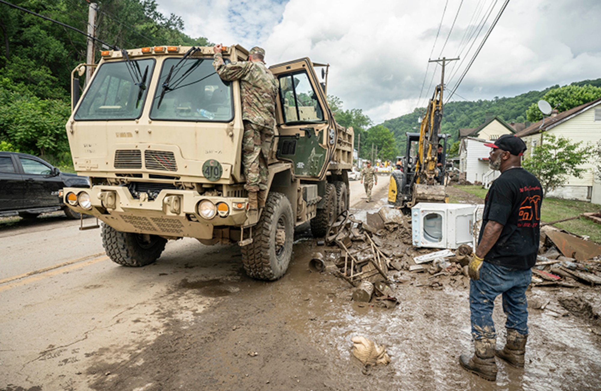 West Virginia National Guard Adjutant General Maj. Gen. Jim Seward visits with Guard members activated on flood response duty in Ohio County, West Virginia, on June 17, 2025.