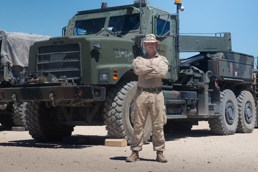 U.S. Marine Corps Sgt. Connor Myshrall, a motor vehicle operator with Truck Company, 23rd Marine Corps Regiment, 4th Marine Division, poses for a photo during Integrated Training Exercise 3-25 (ITX 3-25) on Marine Corps Air Ground Combat Center, Twentynine Palms, California, June 16, 2025. ITX is a critical Marine Air-Ground Task Force exercise for the Marine Forces Reserve’s training cycle, confirming unit readiness through live-fire and combined arms integration. (U.S. Marine Corps photo by Cpl. Isaiah W. Smith)