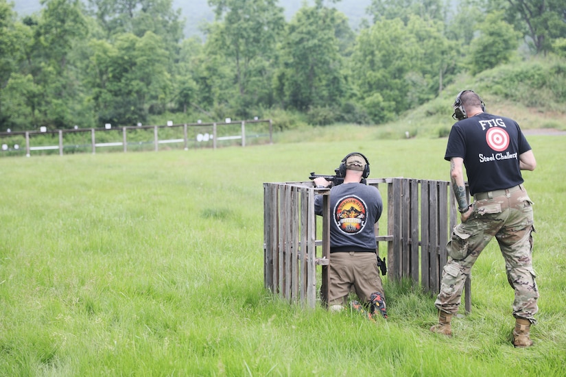 U.S. Army Col. Kevin D. Potts fires at steel targets during the 2025 FTIG 2-Gun Steel Shoot at Fort Indiantown Gap, Pennsylvania, June 14, 2025.