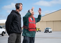 Gary Lee marshals in a B-52H Stratofortress.