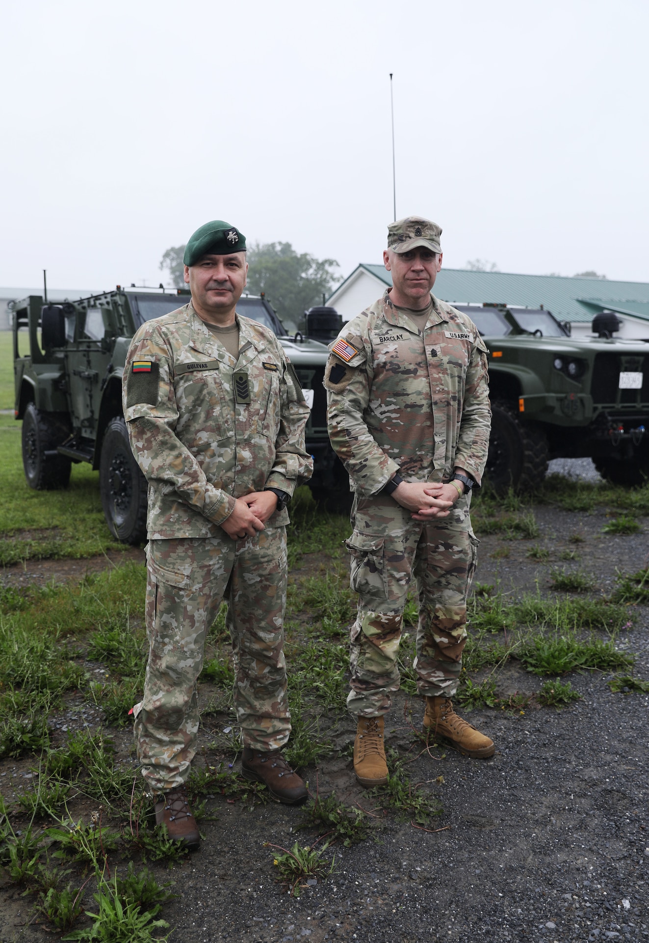 Lithuanian Command Sgt. Maj. Ruslanas Gulevas, senior enlisted leader of the Grand Duke Algirdas Infantry Battalion, Lithuanian Land Forces, left, and U.S. Army Command Sgt. Maj. Jason L. Barclay, senior enlisted advisor for 1st Battalion, 111th Infantry Regiment, 56th Stryker Brigade Combat Team, Pennsylvania Army National Guard, tour Fort Indiantown Gap as part of a bilateral engagement through the State Partnership Program, June 15, 2025.