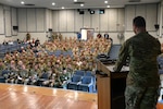 U.S. Army Lt. Col. Randall Phillips, the lead planner and CASA Branch Chief, Phillips welcomes CASA partners to Regional Cooperation 25 at Joint Base Cape Cod, Massachusetts, June 16, 2025, during exercise Regional Cooperation 25. Regional Cooperation 25 is an annual, multi-national U.S. Central Command sponsored command-post and field training exercise conducted by National Guard units in partnership with Central and South Asia nations. (U.S. Air Force photo by Staff Sgt. Colten Tessness)
