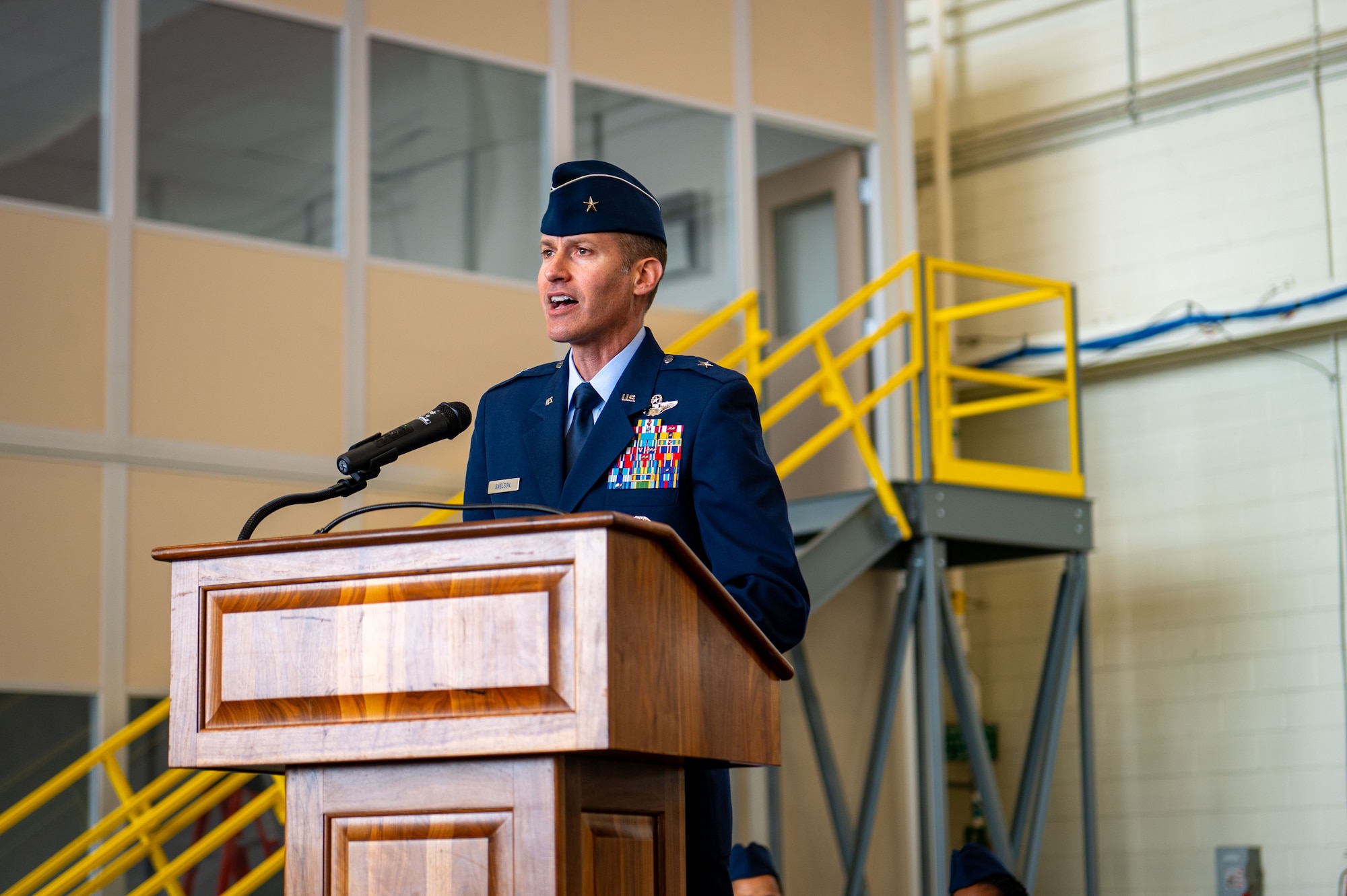 U.S. Air Force Brig. Gen. Stephen Snelson, U.S. Air Force Expeditionary Center commander, addresses the crowd during the Joint Base McGuire-Dix-Lakehurst and 87th Air Base Wing change of command ceremony at JB MDL, N.J., June 17, 2025.