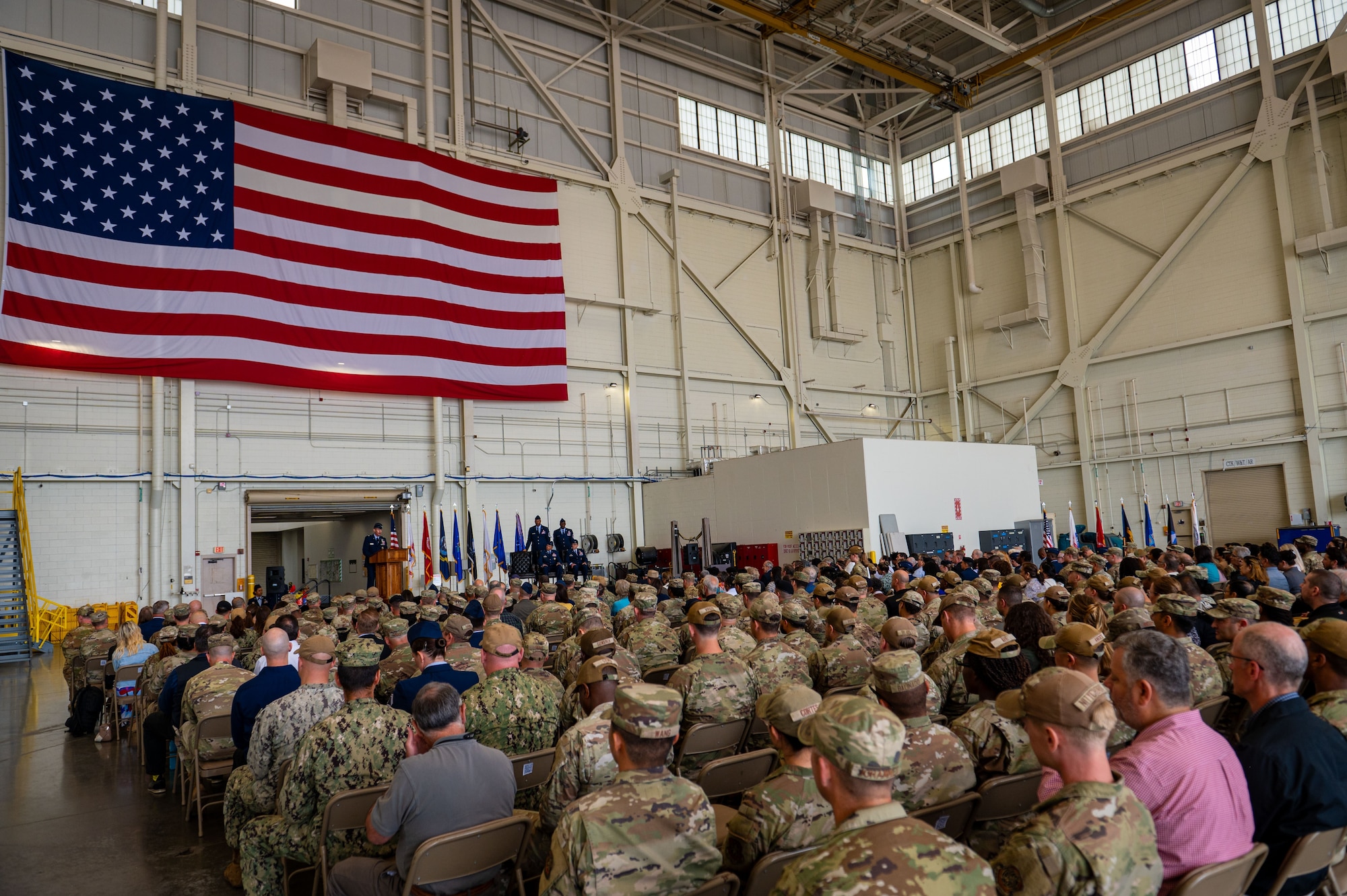 Members of the Joint Base McGuire-Dix-Lakehurst community witness the JB MDL and 87th Air Base Wing change of commander ceremony at JB MDL, N.J., June 17, 2025.
