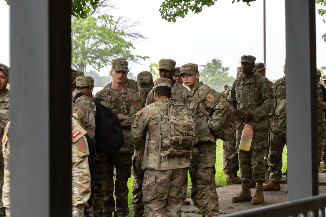 Soldiers assigned to the 1st Infantry Division gather for redeployment.
