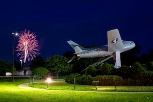 Image of fireworks display behind static display.