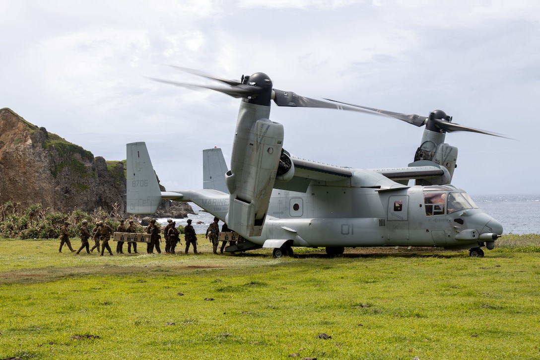 U.S. Marines with 3d Littoral Combat Team, 3d Marine Littoral Regiment, 3d Marine Division, offload gear from a U.S. Marine Corps MV-22B Osprey assigned to Marine Medium Tiltrotor Squadron (VMM) 364, Marine Aircraft Group 39, 3rd Marine Aircraft Wing, after landing at Basco Island, Batanes, Philippines during KAMANDAG 9, May 27, 2025. KAMANDAG is an annual Philippine Marine Corps and U.S. Marine Corps-led exercise aimed at enhancing the Armed Forces of the Philippines’ defense and ex capabilities by providing valuable training in combined operations with foreign militaries in the advancement of a Free and Open Indo-Pacific. (U.S. Marine Corps photo by Staff Sgt. Luc Boatman)