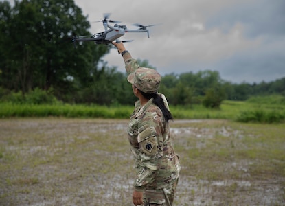 Sgt. Lucero Martinez, an unmanned aircraft systems operator, assigned to Detachment 1, Delta Company, 545th Brigade Engineer Battalion, 45th Infantry Brigade Combat Team, helps launch an unmanned aircraft system during a UAS exercise on June 12, 2025 at Camp Gruber Training Center, Oklahoma. The exercise, hosted by the 45th IBCT and featured numerous UAS and counter-UAS systems, focused on preparing infantry Soldiers to react to UAS threats. (Oklahoma National Guard photo by Spc. Cambrie Cannon)